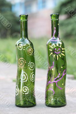 Two bottles on a roadway