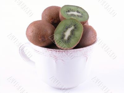 fresh, green kiwi in big cup