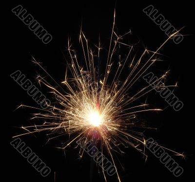 Bright light of sparkling holiday pyrotechnic