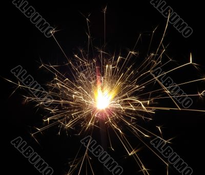 Bright light of sparkling holiday pyrotechnic