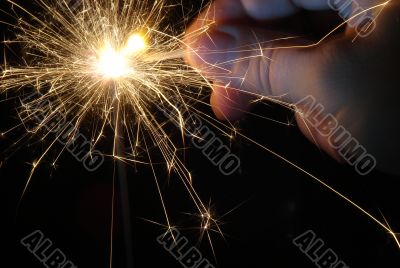 Bright light of sparkling holiday pyrotechnic
