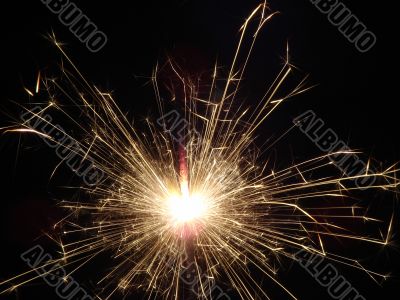 Bright light of sparkling holiday pyrotechnic