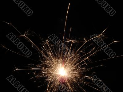 Bright light of sparkling holiday pyrotechnic