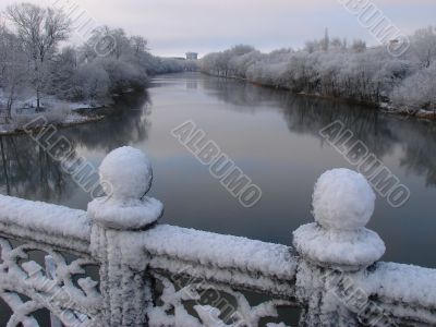 Spring snowy morning riverside