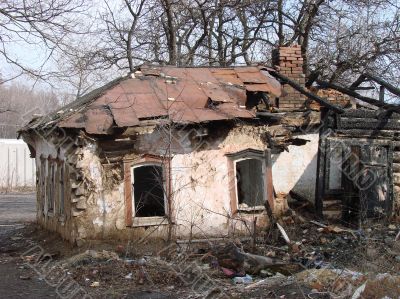 Burned abandoned wintage town building