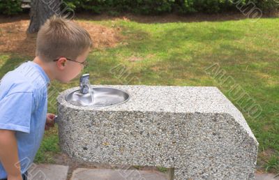 Boy at Water Fountain