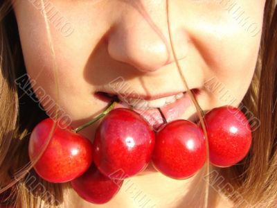 The girl with a sweet cherry