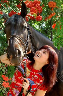 Brunette female model with horse