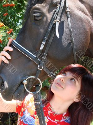 Brunette female model with horse