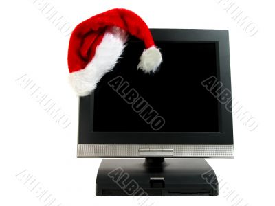 Santa`s hat on a desktop computer