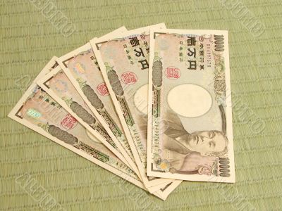 Japanese money on tatami floor