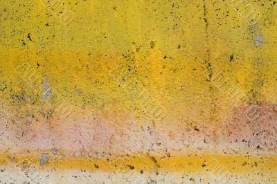 Grunge yellow painted wall