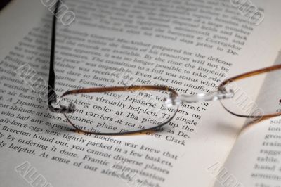 reading glasses and book