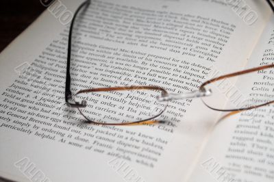 reading glasses and book