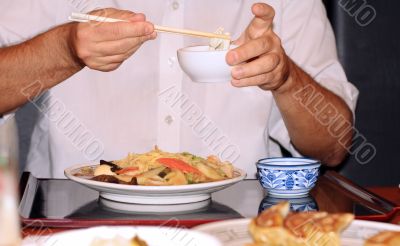 Eating with chopsticks