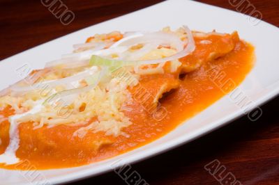 Tacos with red sauce. Close-up