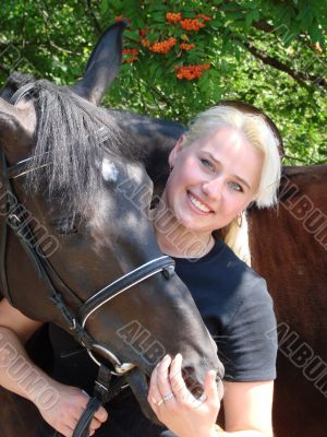 Blond Female Model with Dark Horse