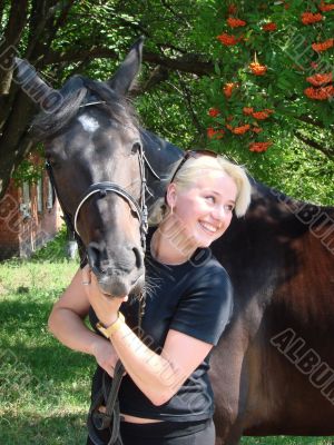 Blond Female Model with Dark Horse