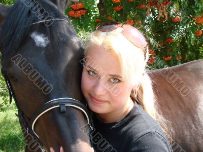 Blond Female Model with Dark Horse