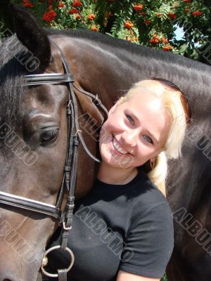 Blond Female Model with Dark Horse