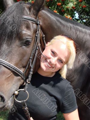 Blond Female Model with Dark Horse