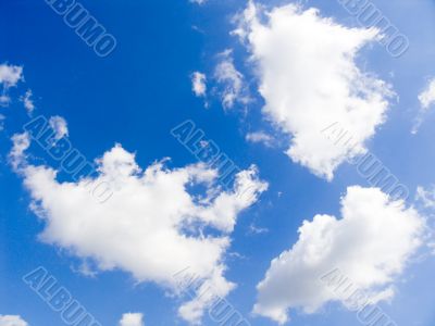 Clouds in the dark blue sky