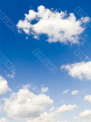 Clouds in the dark blue sky