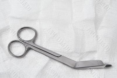medical scissors and gauze