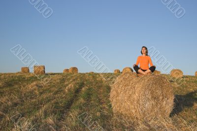 Beautiful woman making yoga