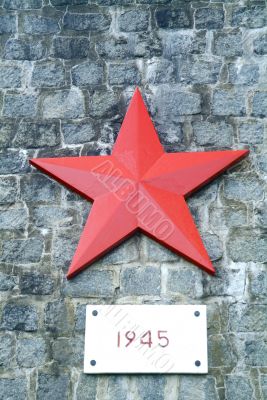 Monument with red star