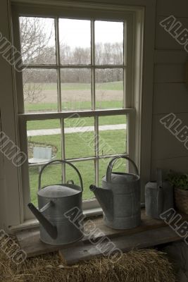 Three Watering Cans