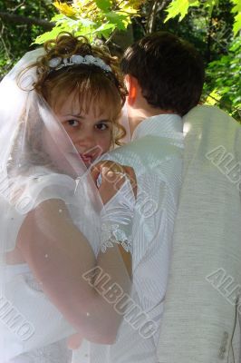 Young happy ewlyweds