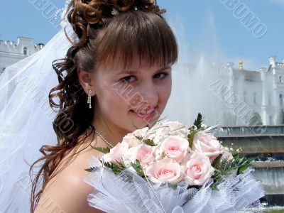 Smiling Bride With Wedding Rose Bouquet