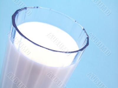 milk on blue background