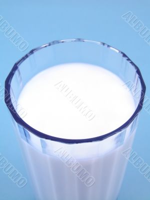 milk on blue background