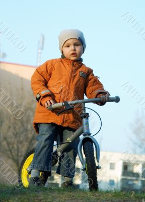 The boy and a bicycle