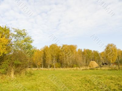  autumn landscape with a haystack