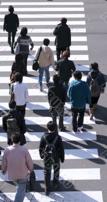 Group of people crossing the street