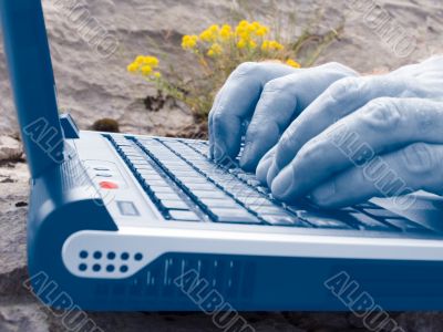 working on laptop