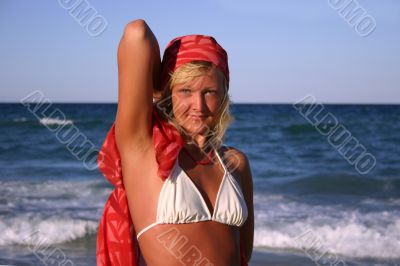 Blonde in red headscarf