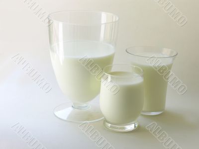 white milk in some glasses
