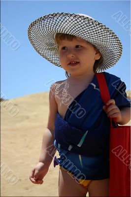 Little girl in panama on the beach
