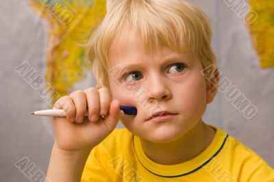 little boy thinking
