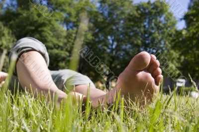 feet in grass