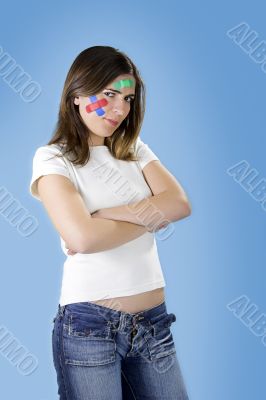 Woman with bandages on the face