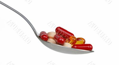 Spoon with capsules