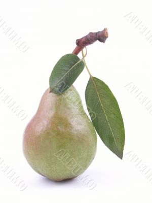 green pear with leaves isolated