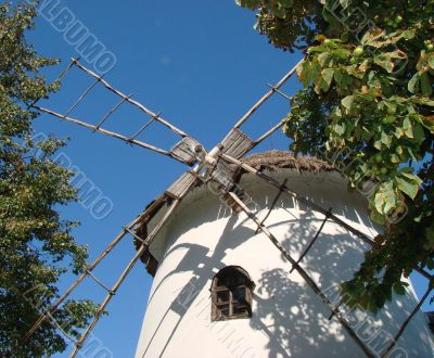 Ancient Ukrainian Mill in Summer Village