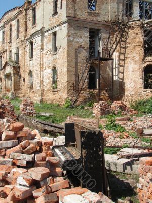 The Old Broken Piano Among Ruins