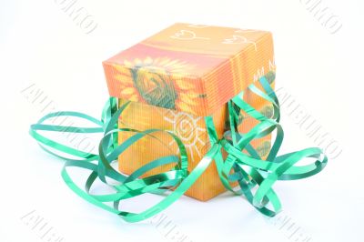 green ribbon and colorful box